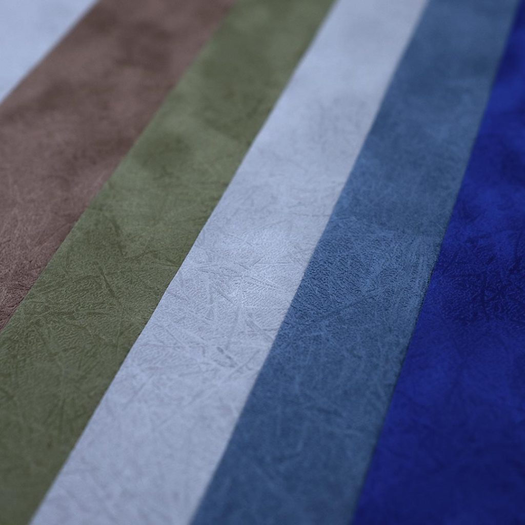 Close up of Lynel Twig Suede Paper family of products