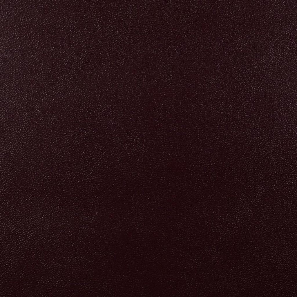 Close up of texture of Casina 26056 Brown PVC material.