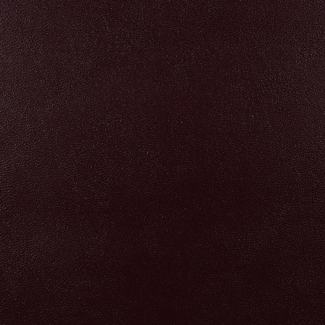 Close up of texture of Casina 26056 Brown PVC material.