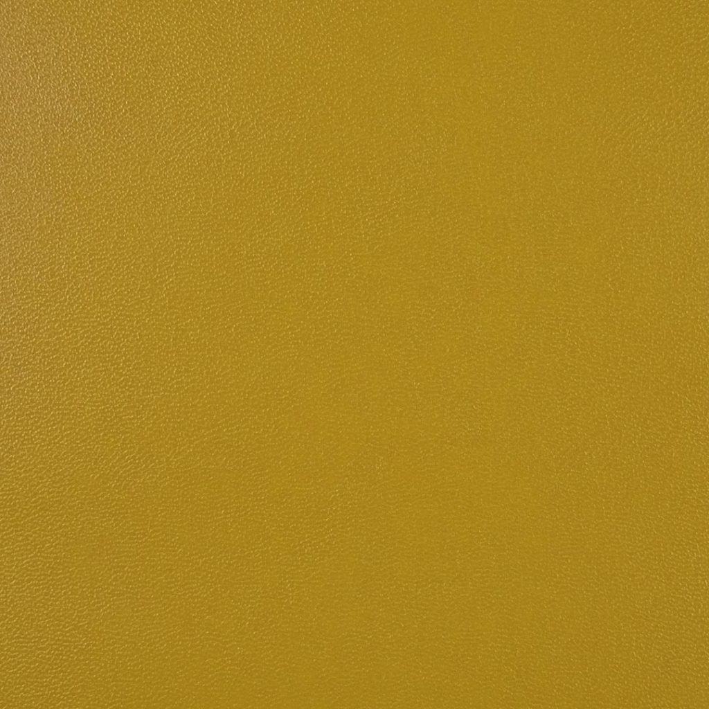 Close up of texture of Casina 26061 Yellow PVC material.