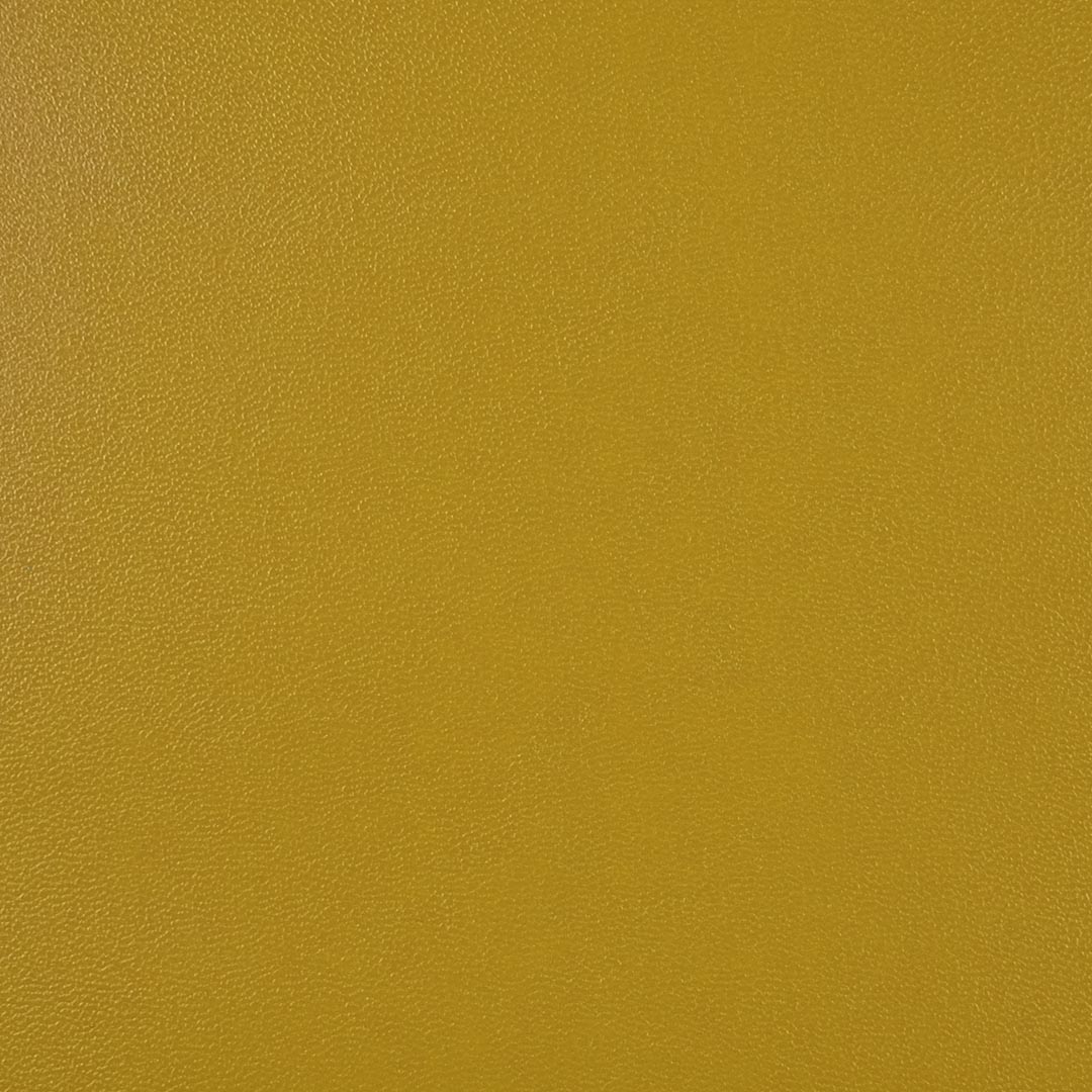 Close up of texture of Casina 26061 Yellow PVC material.