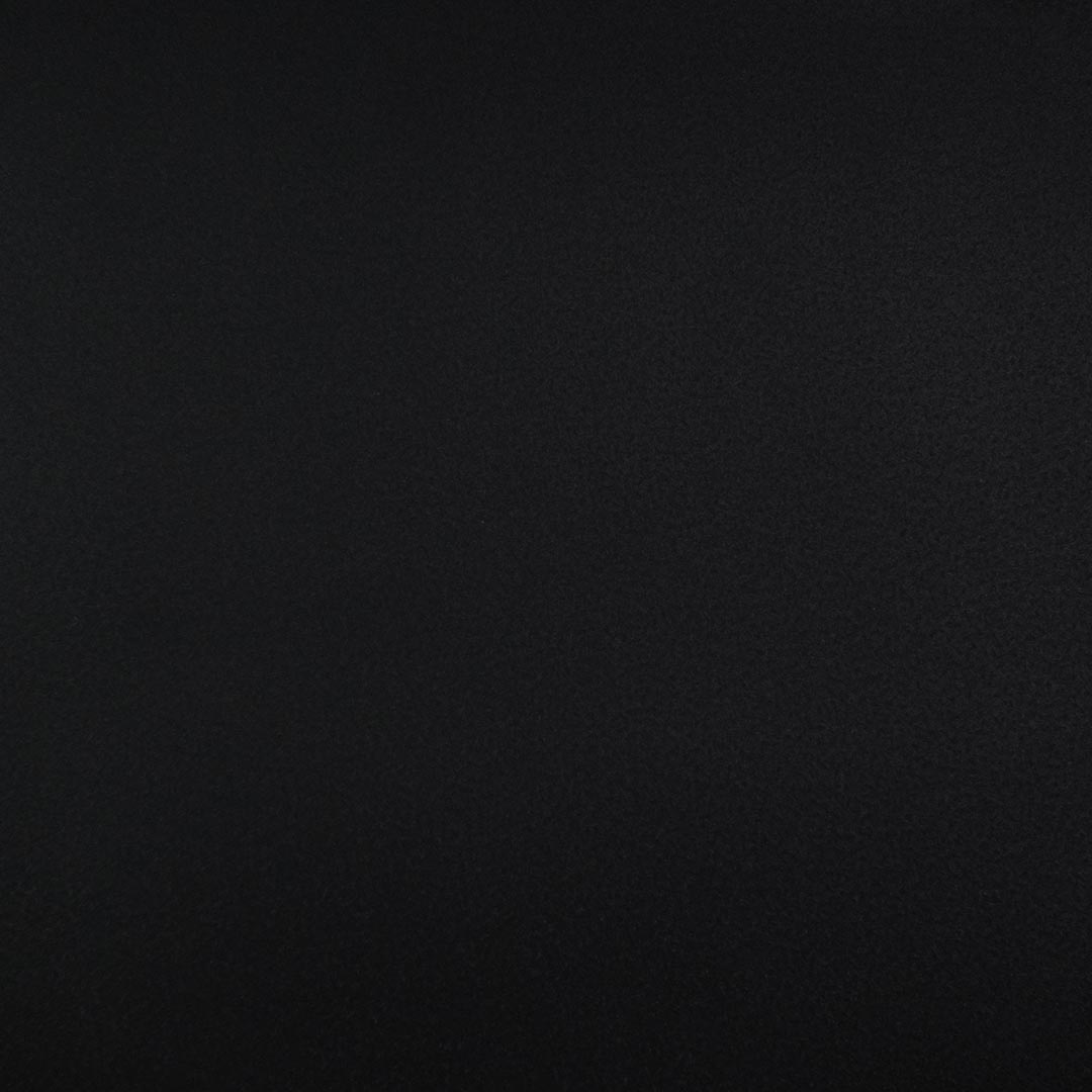 Close up of texture of Fluctuations 29401 Black PVC material.