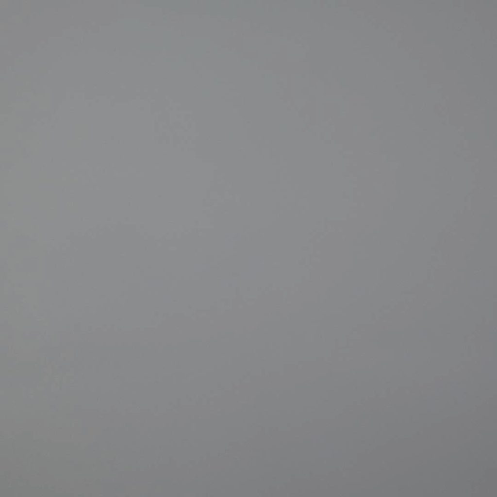 Close up of texture of Fluctuations 29408 Grey PVC material.