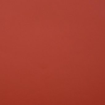 Close up of texture of Fluctuations 29438 Orange PVC material.