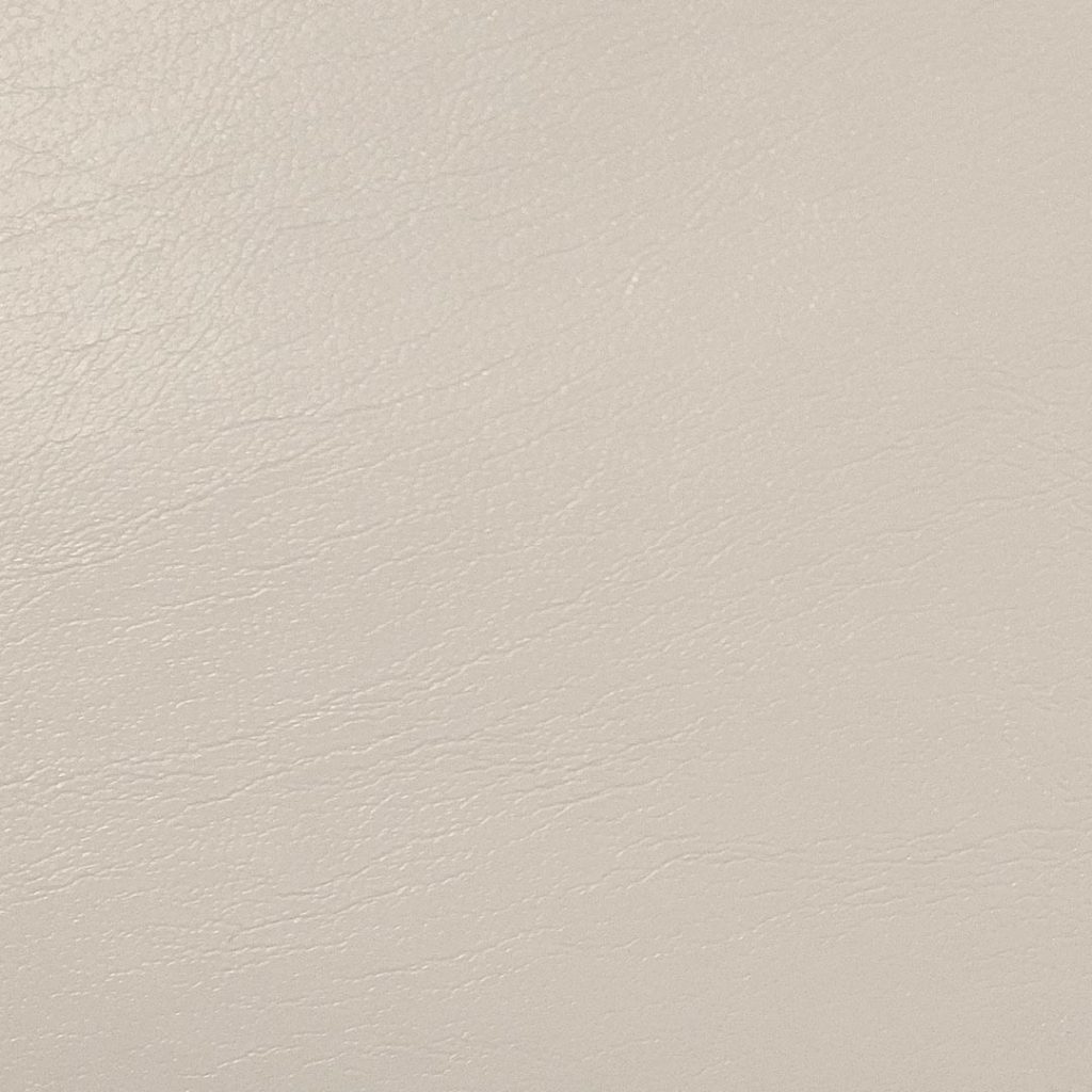 Close up of texture of Ismara 26016 Beige PVC material.