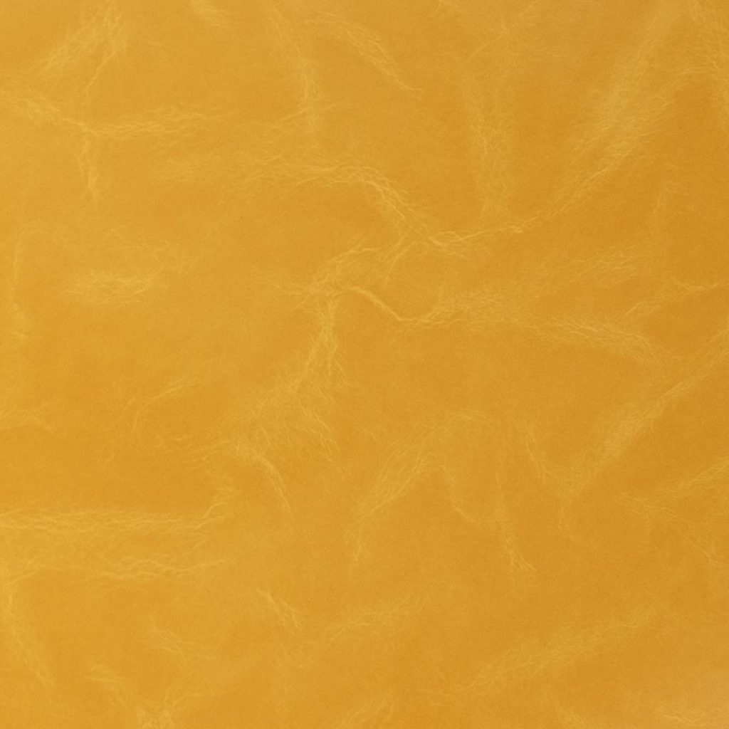 Close up of texture of Istrana 26210 Yellow PVC material.