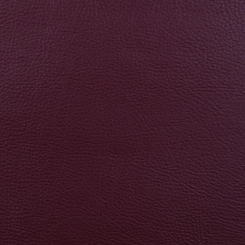 Close up of texture of Pellana 23263 Bordeux PVC material.