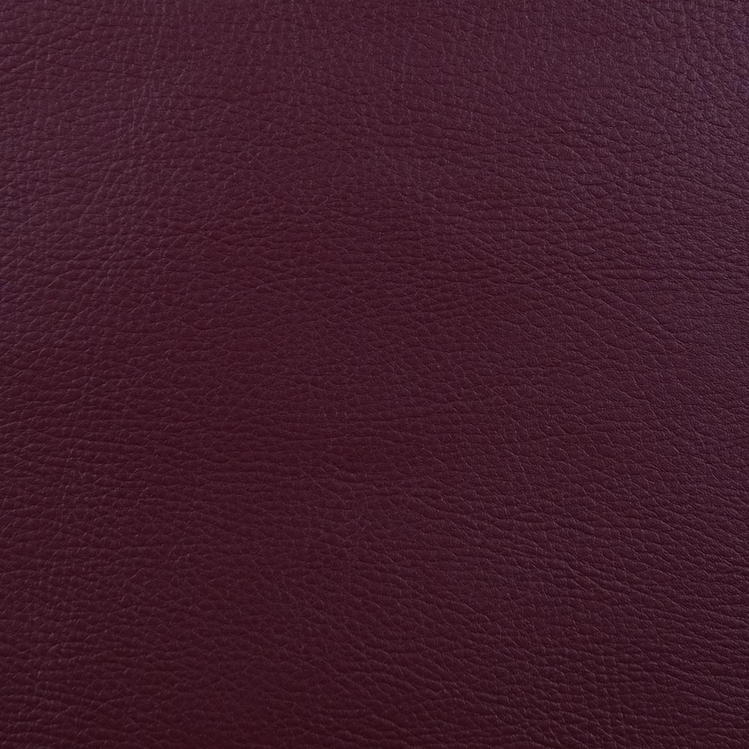 Close up of texture of Pellana 23263 Bordeux PVC material.
