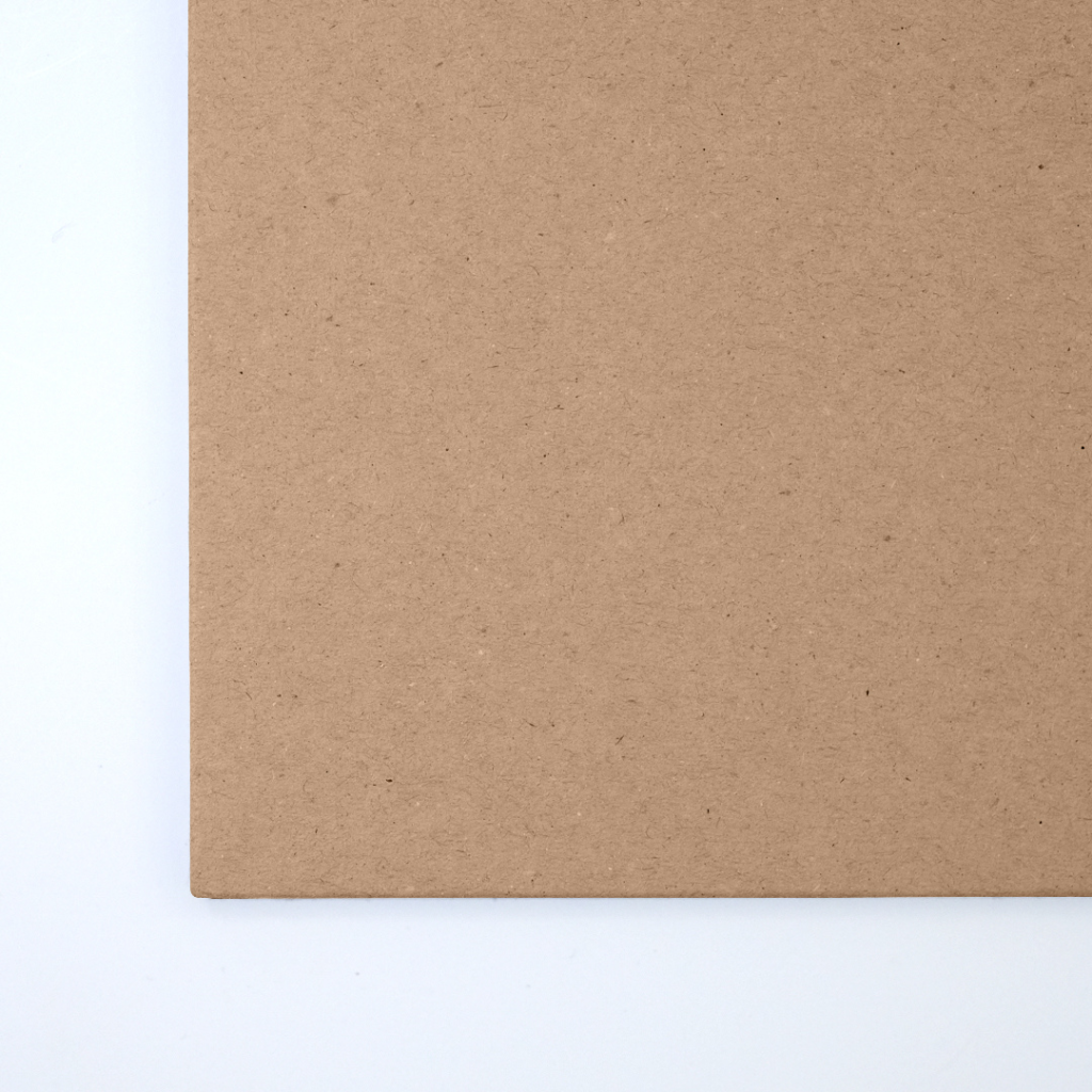 Close up of texture of a solid brown paperboard.